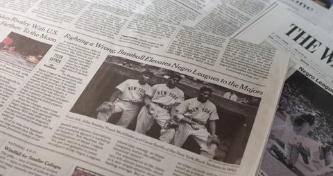 New York, New York  United States - December 17,  2020: Newspaper coverage of. MLB Recognizes Negro Leagues As 'Major League' Headlines, picture, articles.
