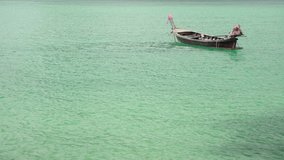Floating old wooden boat on water sea, nature seascape  