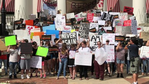 Tallahassee, Florida, United States - February 21, 2018. A large group of students rallying at the capitol to protest current gun laws in the wake of a deadly shooting at Stoneman Douglas High School.