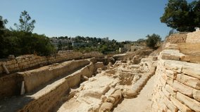A geological excavation site in the vicinity of the old city of Jerusalem, the newer city is visible in the background, a 4K video clip, Jerusalem, Israel.