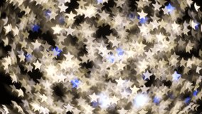Videos of stars in blur, they flash white and blue. Festive illumination. 