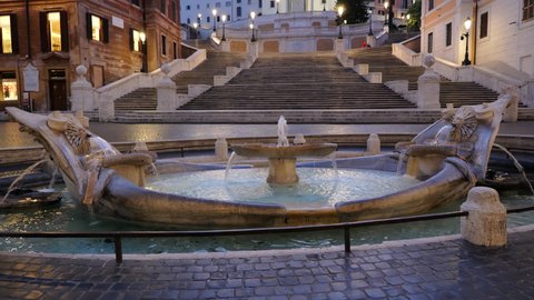 City of Rome at dawn in Italy, Spanish Steps and Barcaccia Fountain on Piazza di Spagna square
