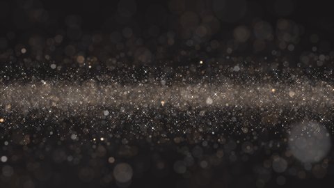 Golden glitter in black background, Particle background, Glow sparkles, Luxury background, Backdrop, 4k Resolution seamless loop.