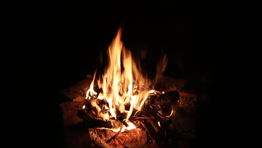 The campfire with the sound of burning wood burning is beautiful Royalty-Free Stock Footage #1064925172