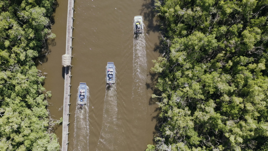 Aerial droneshot of hovercraft boats in the Everglades