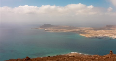 Lanzarote, Sky timelapse over Mirador Del Rio to La Graciosa island, Canary Islands