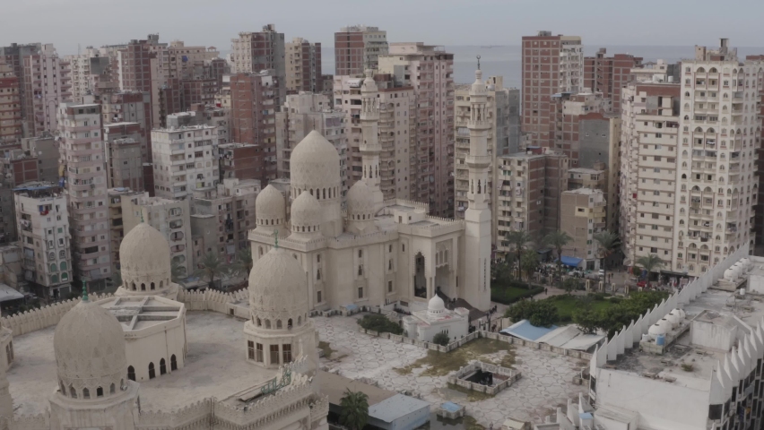 Aerial Drone shot over Egypt Alexandria city streets downtown 