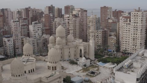 Aerial Drone shot over Egypt Alexandria city streets downtown 