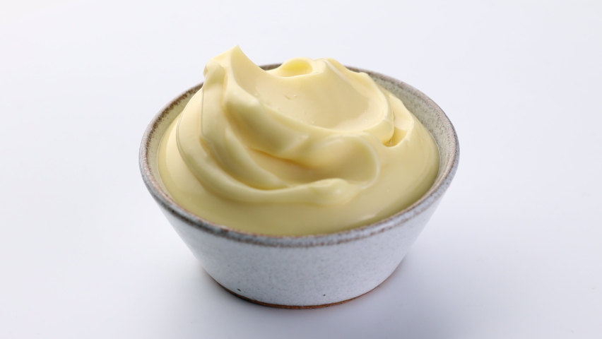 Rotating mayonnaise bowl on white background | Shutterstock HD Video #1064935573