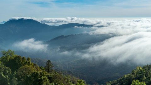 Cloud movements, A sea of fog misty clouds flowing with mountain hill from Doi Inthanon Nation Park, Chiang Mai Thailand. Mountain sunrise time lapse nature landscapes in morning time.
