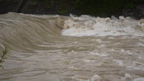 25 May 2019 , Munich, Germany - Flood on the Isar north of Munich after several days of rain. HD video, daylight.