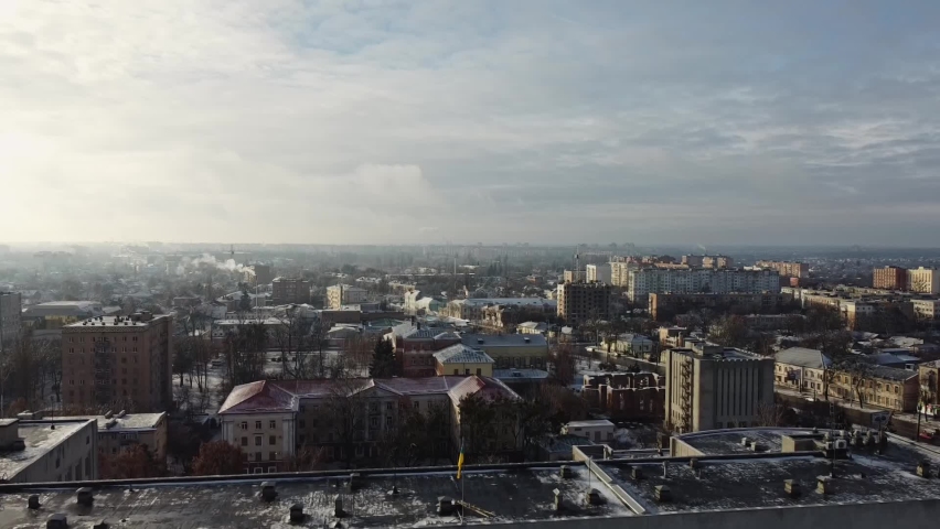 European town centre, Poltava city in Ukraine. Aerial drone shot. government building with ukraine flag