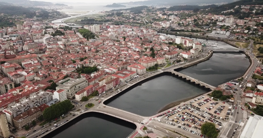Aerial view of Pontevedra cityscape with a modern apartment buildings and sea bay, Spain Royalty-Free Stock Footage #1064956573