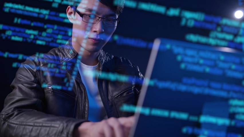 Asian man using computer with futuristic computer code cyber  crime, computer engineer programmer typing code cyber security hacking, internet network digital technology concept. Royalty-Free Stock Footage #1064967562