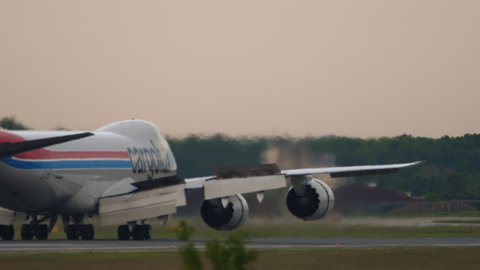 NOVOSIBIRSK, RUSSIAN FEDERATION - JUNE 10, 2020: Cargolux Boeing 747 LX-VCN landing and slowing. Tolmachevo Airport, Novosibirsk