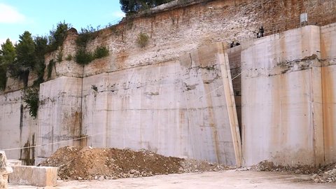 A travertine quarry. the moment you come off the wall
Slow motion video shooting of the detachment of the travertine