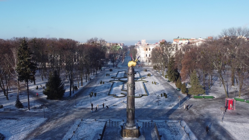 Aerial drone video fo glory statue of golden eagle in city centre of Poltava 