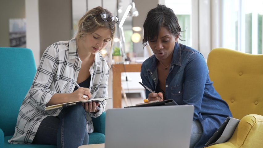 Business people working on laptop in office, a Person Video by goodluz