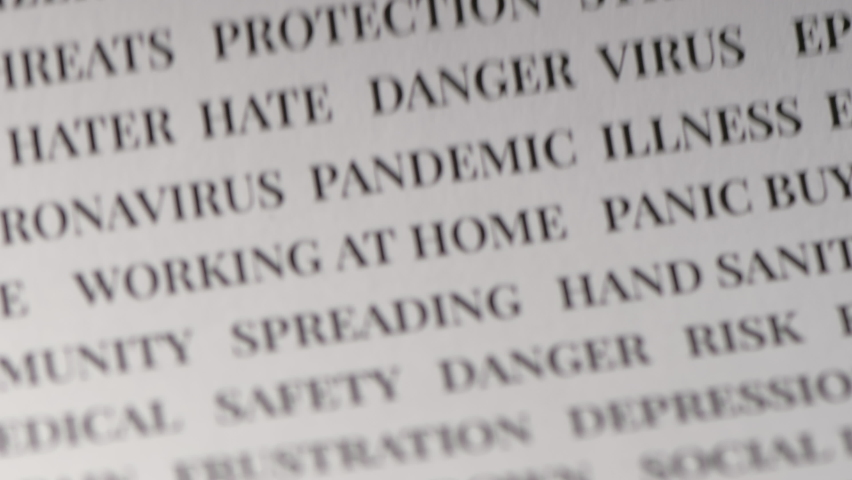 Lots of words on black text on the white paper and highlighting the word pandemic. pandemic