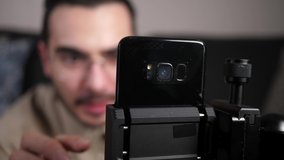 Camera focused on a smartphone being used to video chat