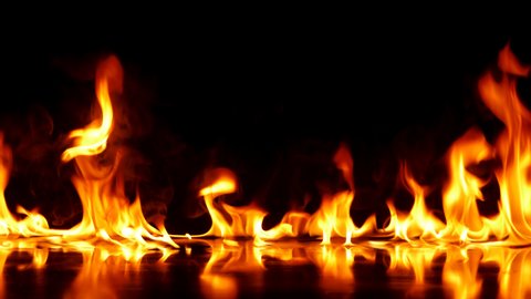 4K Fire Flames Igniting And Burning  - Slow Motion. A line of real flames ignite on a black background Ultra HD. Real fire. Transparent background. PNG + Alpha