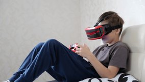 School boy using VR glasses and exploring virtual worlds 3D effects. Modern Gadgets. Headset to dive into video games, 4K