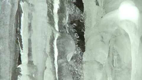 icicle meting on an eroded limestone cliff during a warm winter day on the island of Gotland in Sweden