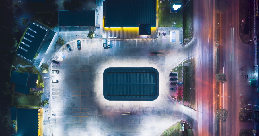 Gas station, petrol station or service station at night. And convenience store, shop, grocery, market or minimart. Light movement from car on road. For refueling, shopping. Aerial view hyperlapse. | Shutterstock HD Video #1065069160