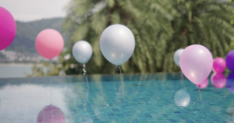 Balloons decoration at the pool party  | Shutterstock HD Video #1065086947