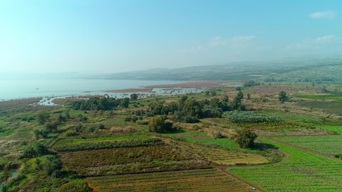 Aerial view of the Sea of Galilee And fields and orchards farmers around