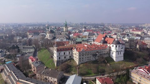 Aerial view of historic part of Lublin overlooking Catholic Archcathedral and Crown Tribunal in Old Town Market, Poland. High quality 4k footage