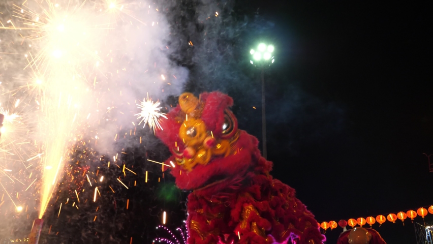 Chinese lion performing during chinese new year celebration at Chinatown Thailand. | Shutterstock HD Video #1065111061