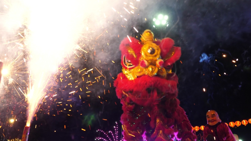 Chinese lion performing during chinese new year celebration at Chinatown Thailand.
