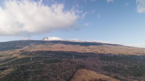 4K Clockwise Hyper-lapse Aerial View of Hallasan, Jeju Volcanic Island
Winter. With snow remaining on top of Hallasan ("Mt. Halla"), the highest mountain in South Korea.