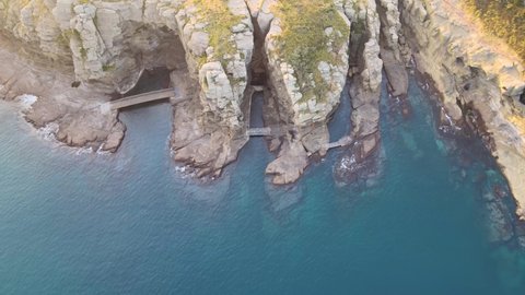 4K Top-down Aerial View of Eastern Trail of Yongmeori (Dragon's Head) Coast, Jeju
Volcanic Island, Sunset. Top ranking tourist attraction. Famous for its dramatic layers of volcanic rock cliffs.