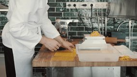 Chefs in protective masks and gloves prepare food in the kitchen of a restaurant or hotel, high kitchen during coronavirus covid 19 pandemic, business reopen after quarantine - Powered by Shutterstock - Get 15% off with code: PIKWIZARD15