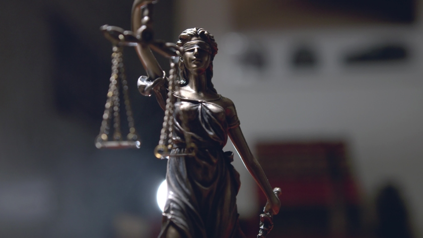 The Statue of Justice - lady justice or Iustitia. Justitia the Roman goddess of Justice in lawyer office Royalty-Free Stock Footage #1065155716