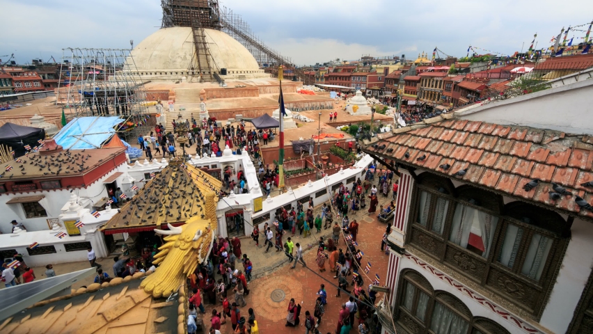Timelapse of Boudhanath stupa under reconstruction after the earthquake in 2015, and many crowds of people came to visit it celebrating Buddha