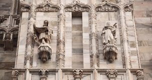 Duomo di Milano filmed in close up video clip.Beautiful catholic cathderal in center of Milan,Italy.Main Italian christian temple in Lombardia,famous tourist landmark 