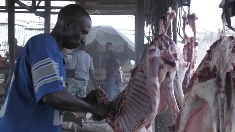 24th December 2020, Lagos Nigeria: Local Goat sellers slaughtering goat in Africa  