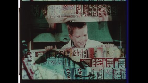 1950s USA Drive-in Movie Theater Intermission Announcement. Young Boy Dreams of Running the Candy Bar, Refreshment Counter Confectionery during Intermission. 4K Overscan of Archival 16mm Film Print