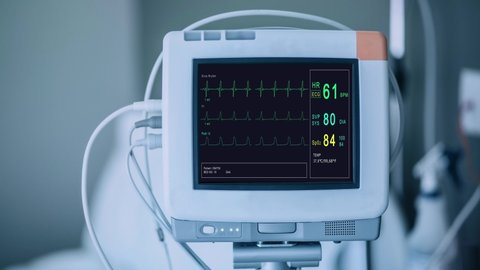 Patient monitor displays vital signs ECG electrocardiogram EKG, oxygen saturation SPO2 and respiration. Medical examination. 4K video footage animation. Cardiac monitoring. Electrocardiography
