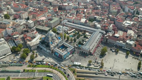 New Mosque under construction in Istanbul next to Grand Bazaar with Car traffic Jam in Rush hour, Aerial Dolly right from above, Istanbul, Turkey on September 17th 2020