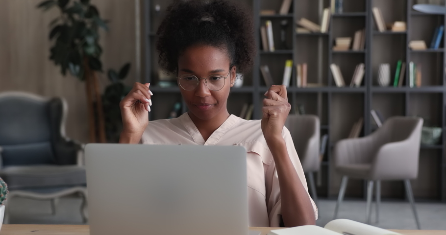 Tired african woman take off glasses resting from laptop work. American businesswoman suffers from dry irritable eyes after long notebook usage. Eye strain, conjunctivitis infection need drops concept Royalty-Free Stock Footage #1065238144