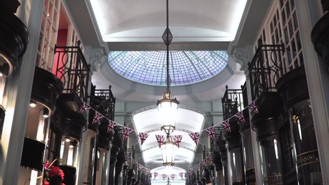 LONDON UK - MAY 21, 2018. Shopping Piccadilly Arcade, an upmarket Victorian shopping arcade in St James Mayfair area of London