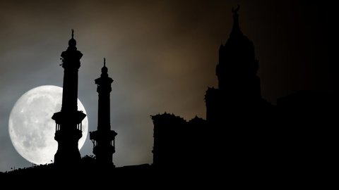 Great Mosque of Mecca: Time Lapse by Night with Full Moon and Symbolic Skyline of Holiest city in Islam , Saudi Arabia