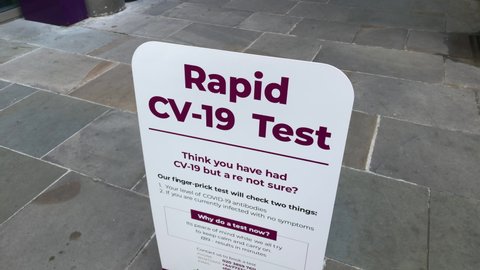 London UK, January 9th 2021: A street sign board for rapid CV-19 or Covid-19 testing. Offering a finger-prick test with fast results. During the 3rd London lockdown. 