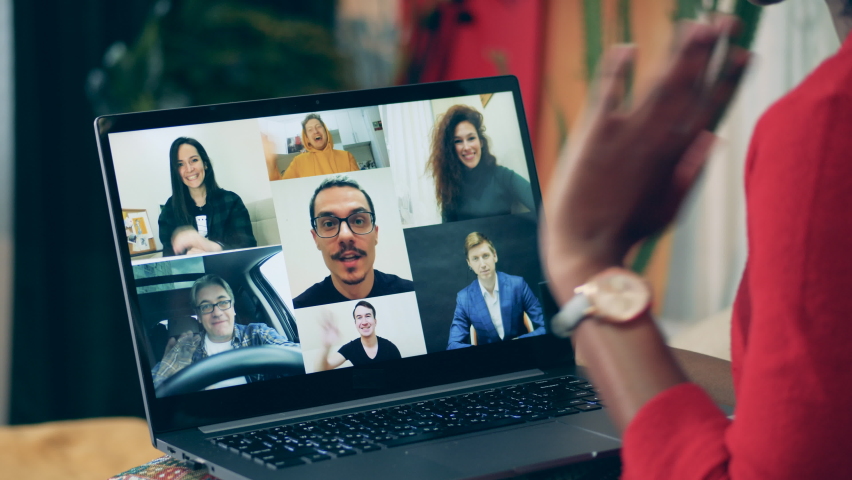 Multiuser online conference shown through woman's laptop. Videoconference meeting, remote work, distance studing concept.
