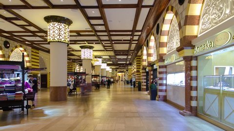DUBAI, UAE - CIRCA MARCH 2019: The Souq in Dubai Mall, traditional arabic style, world's largest shopping mall based on total area timelapse hyperlapse. Dubai, United Arab Emirates