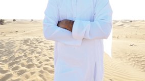 
Cinematic video of a man with emirates white kandura traditional outfit making safari in the desert of Dubai